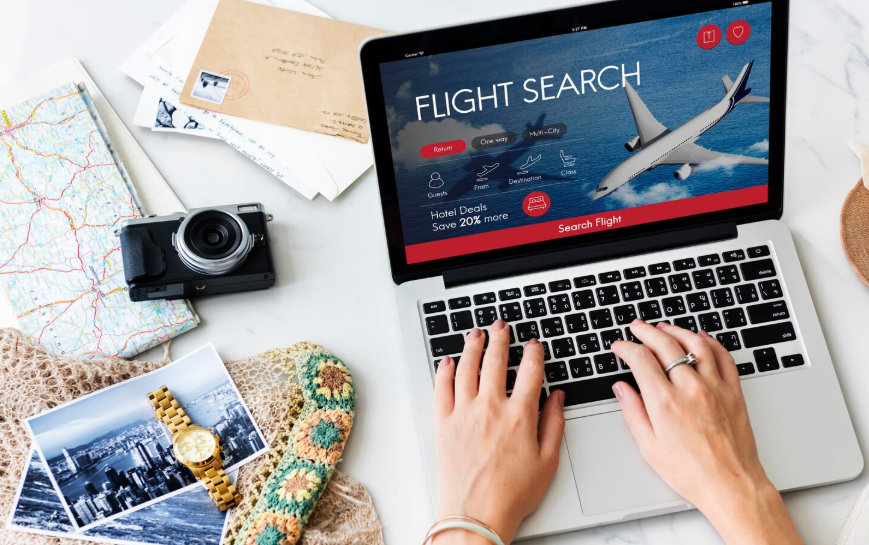 Person searching for flights online, illustrating how travelers find unpublished airline deals.